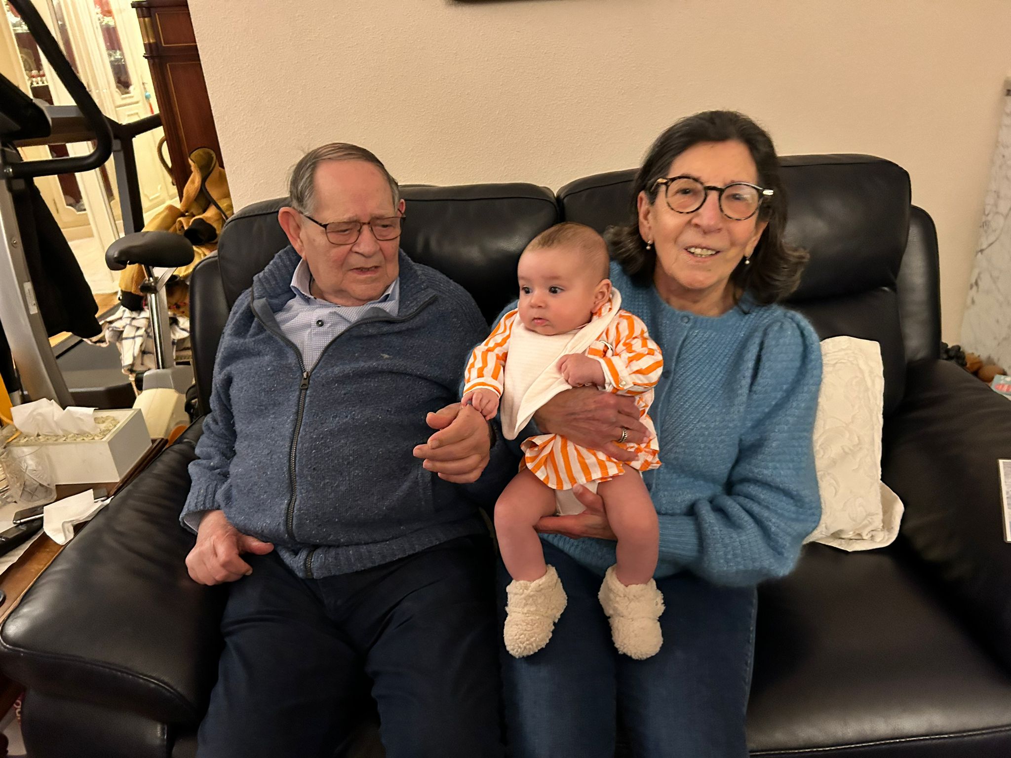 Mousani and his wife with a baby