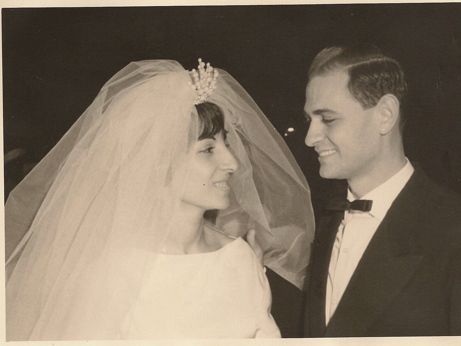 Black-and-white wedding portrait of Mousani and his bride