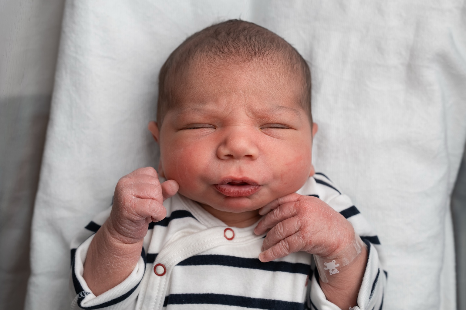 Eden Mousani Cohen resting with his eyes closed