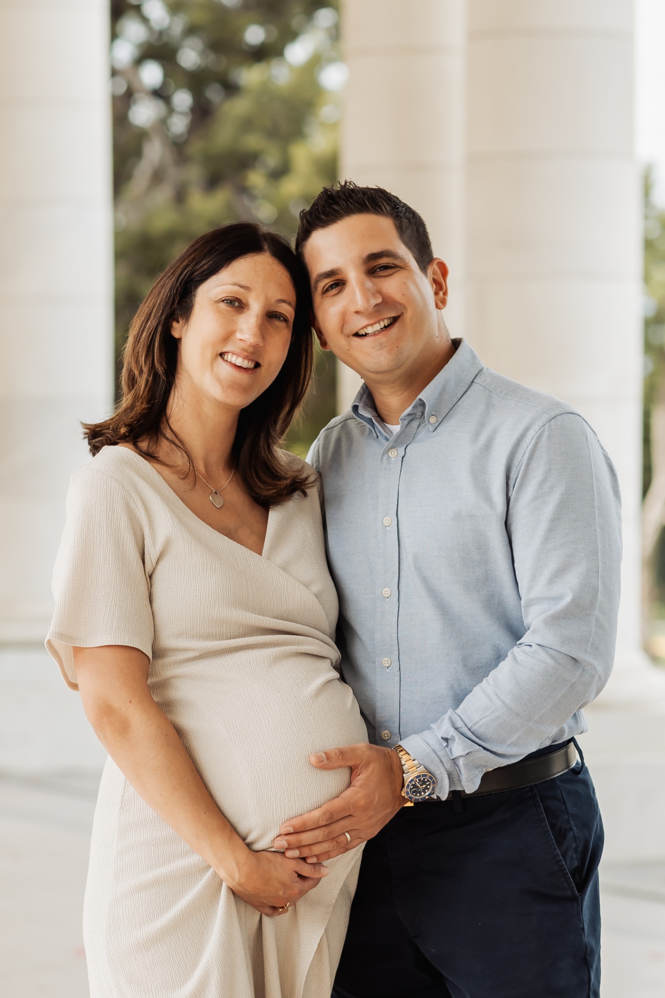 Emily and Steven celebrating their baby boy